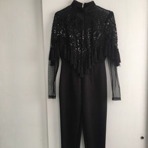 BLACK JUMPSUIT WITH GLITTER AND MEAH DETAIL
